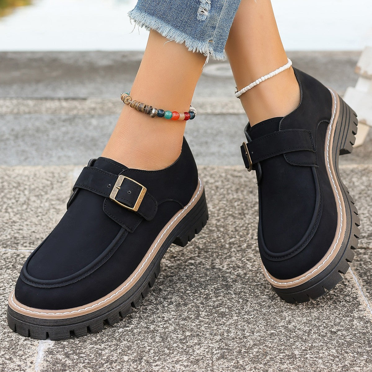 Black platform buckle loafers