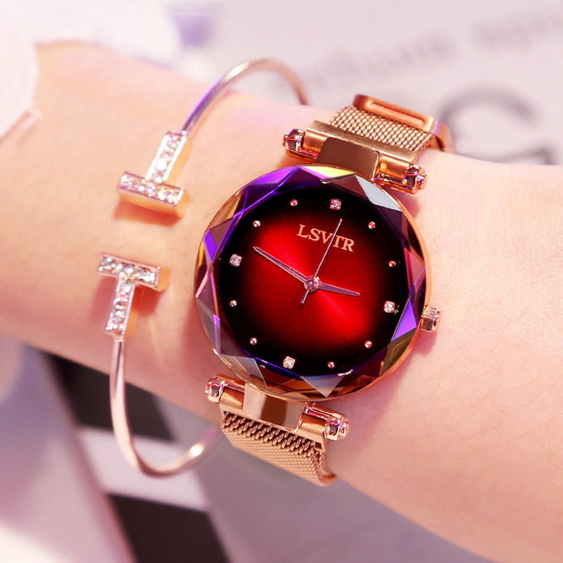 Rose gold watch with starry dial and magnetic mesh strap