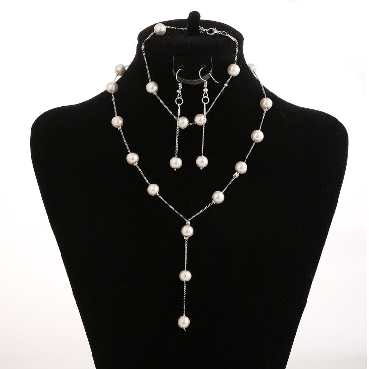 Silver-tone pearl necklace, earrings and bracelet set