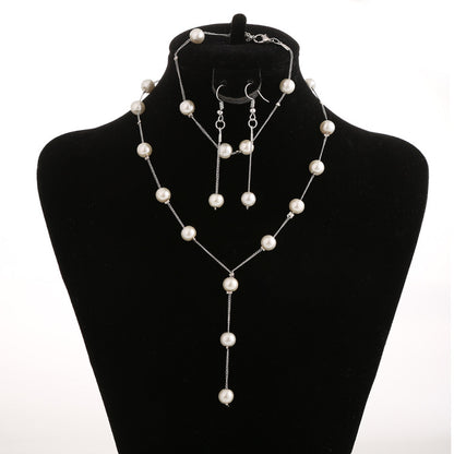Silver-tone pearl necklace, earrings and bracelet set