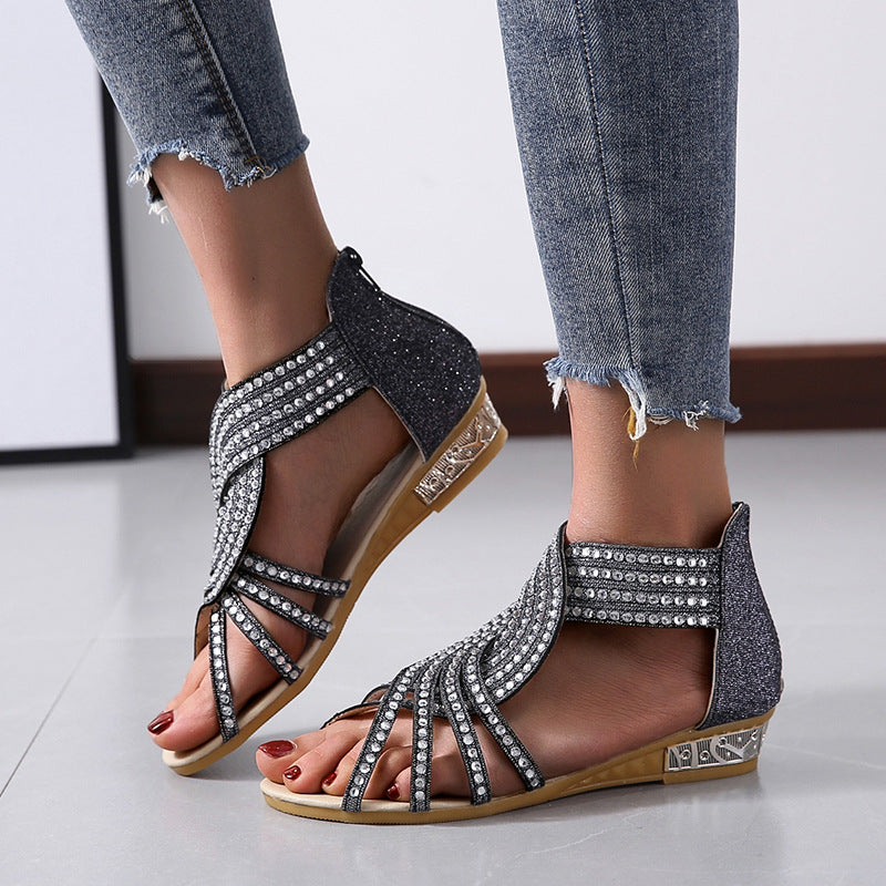 Rhinestone wedge sandals worn