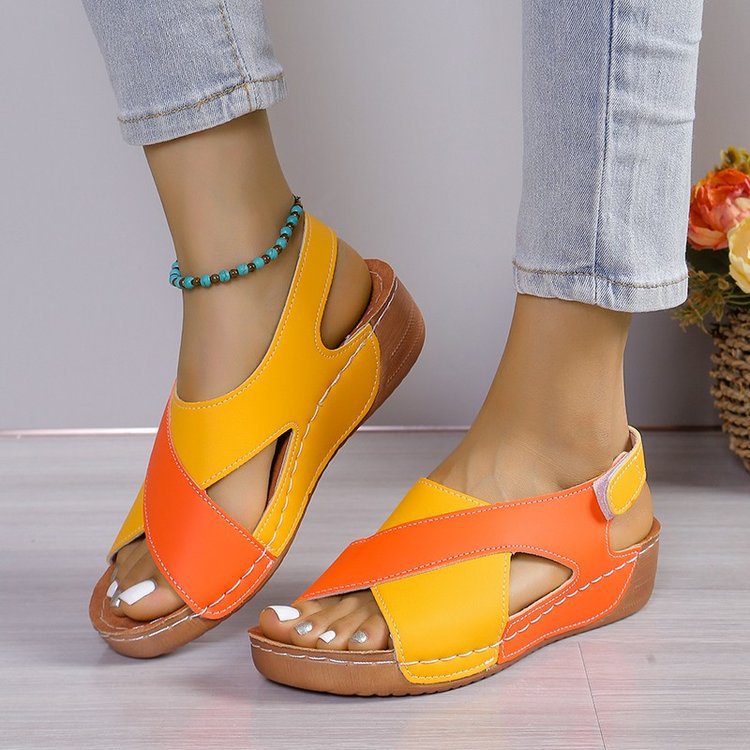 Yellow orange cross-strap wedge sandals