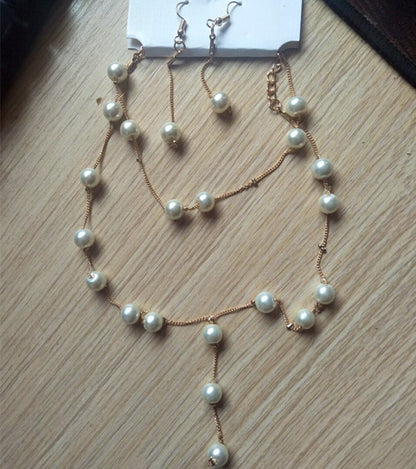 Pearl jewellery set laid flat