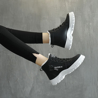 Lace-up boots worn