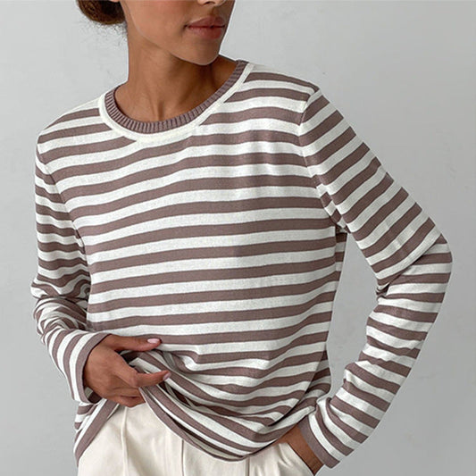 Striped sweater styled with denim for everyday wear