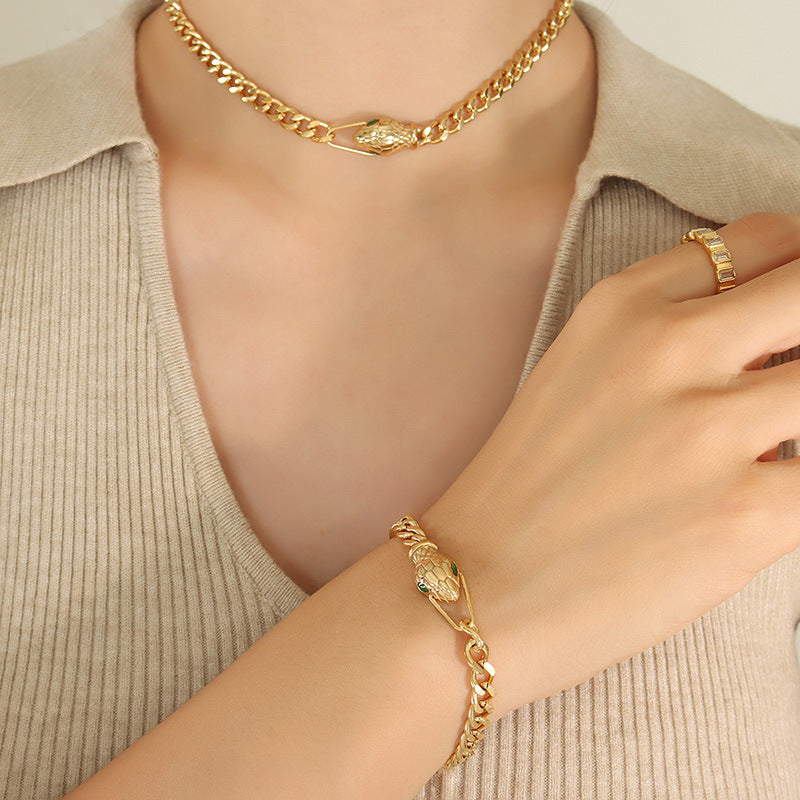 Snake head zircon jewellery worn