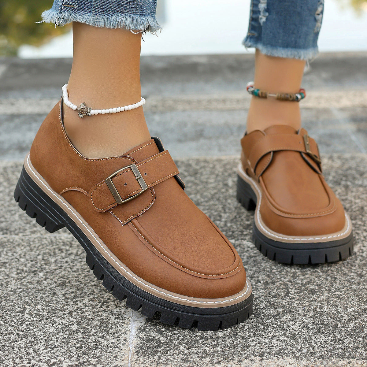 Platform buckle loafers worn with socks