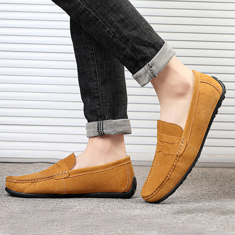 Side profile of the loafer showing the low flat sole