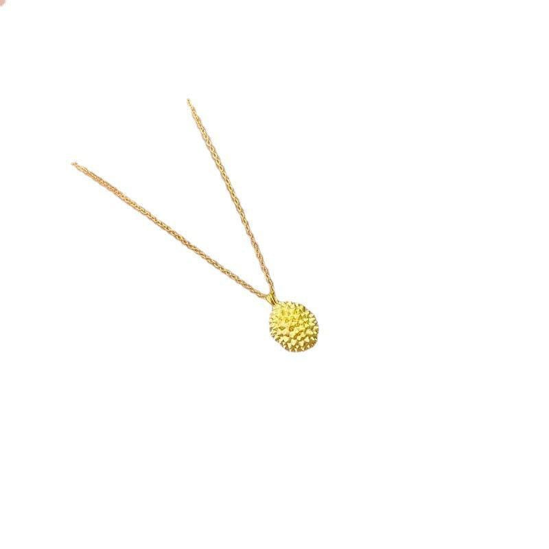 Durian pendant necklace worn