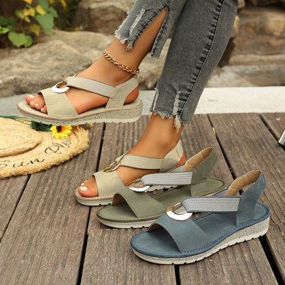 Breezy Wedge Sandals worn outdoors