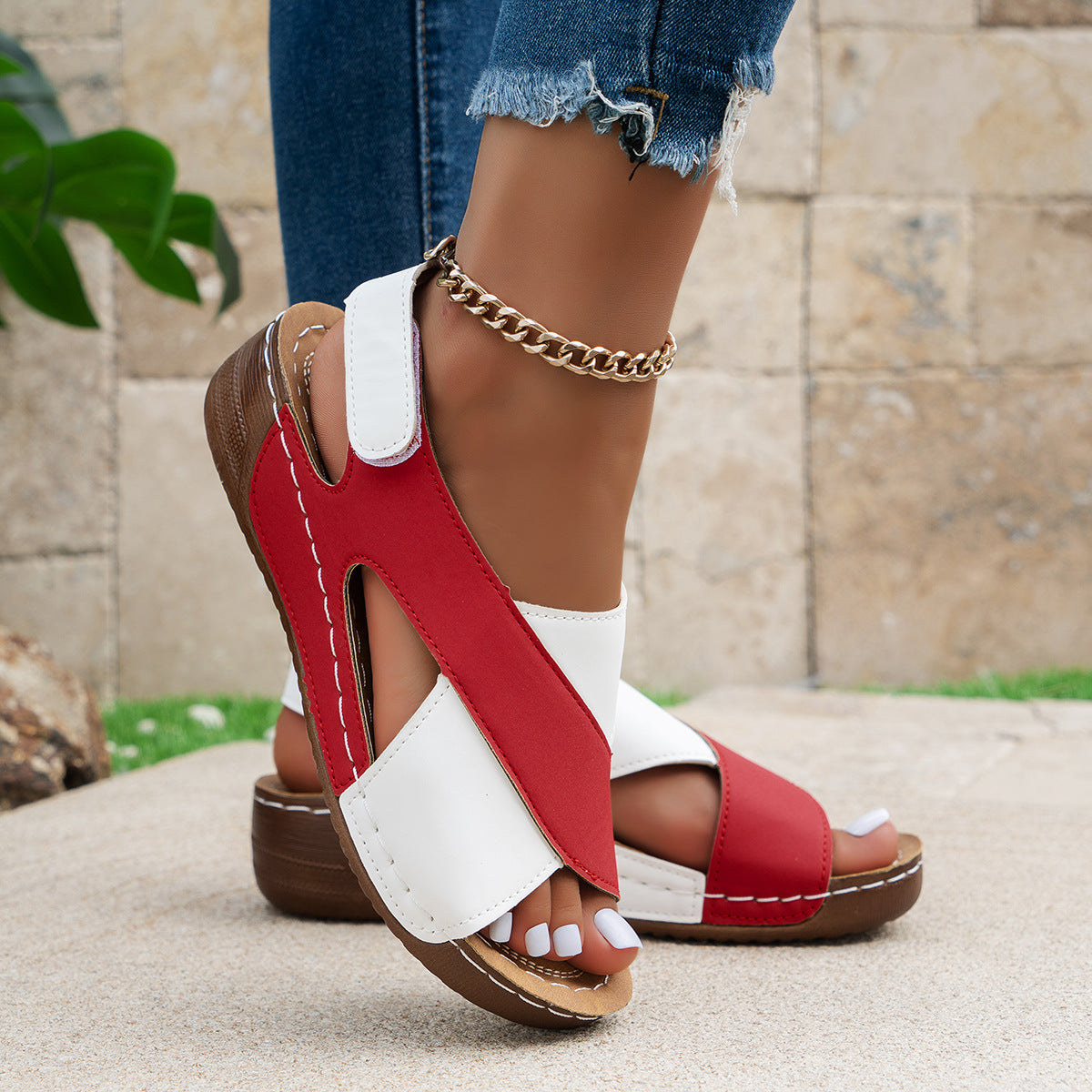 Cross-strap wedge sandals worn with a summer outfit